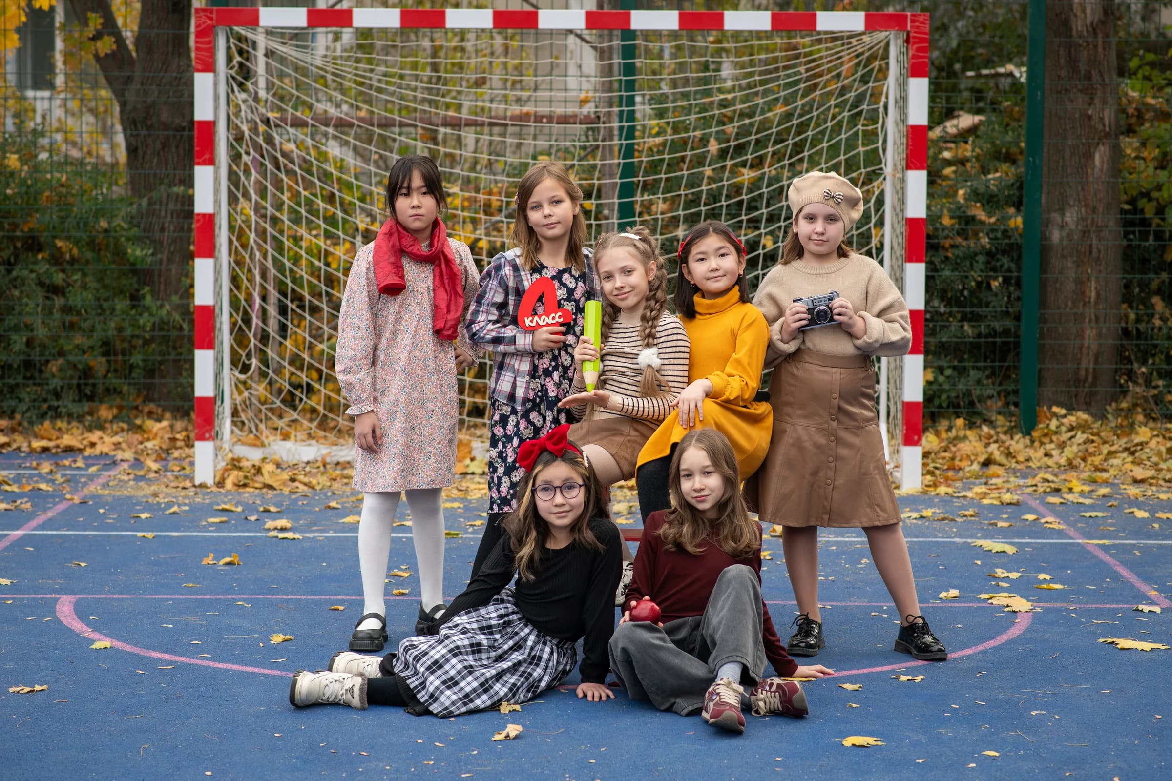 Junior school pupils on a sports ground