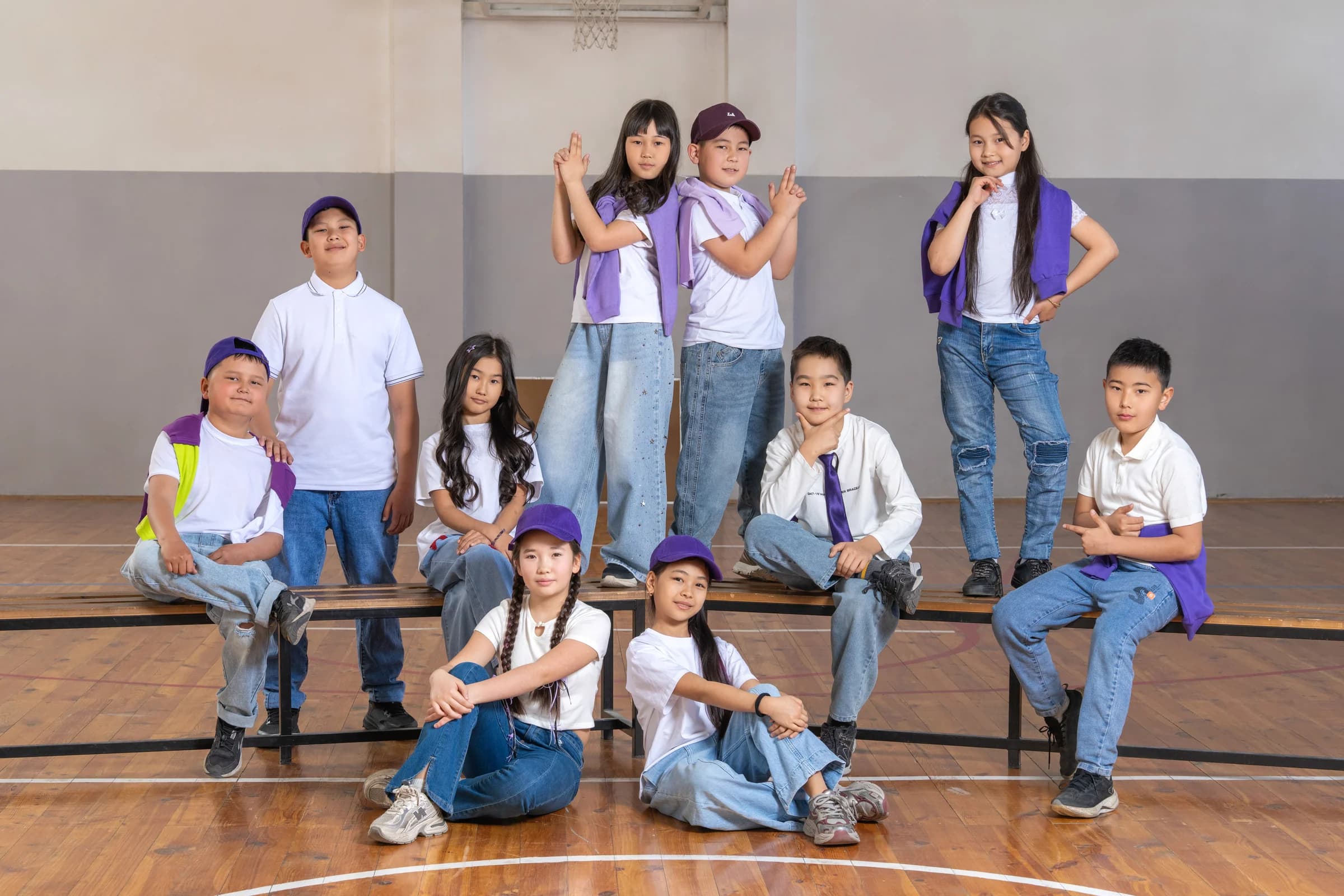 A junior class photo session in the school sports hall
