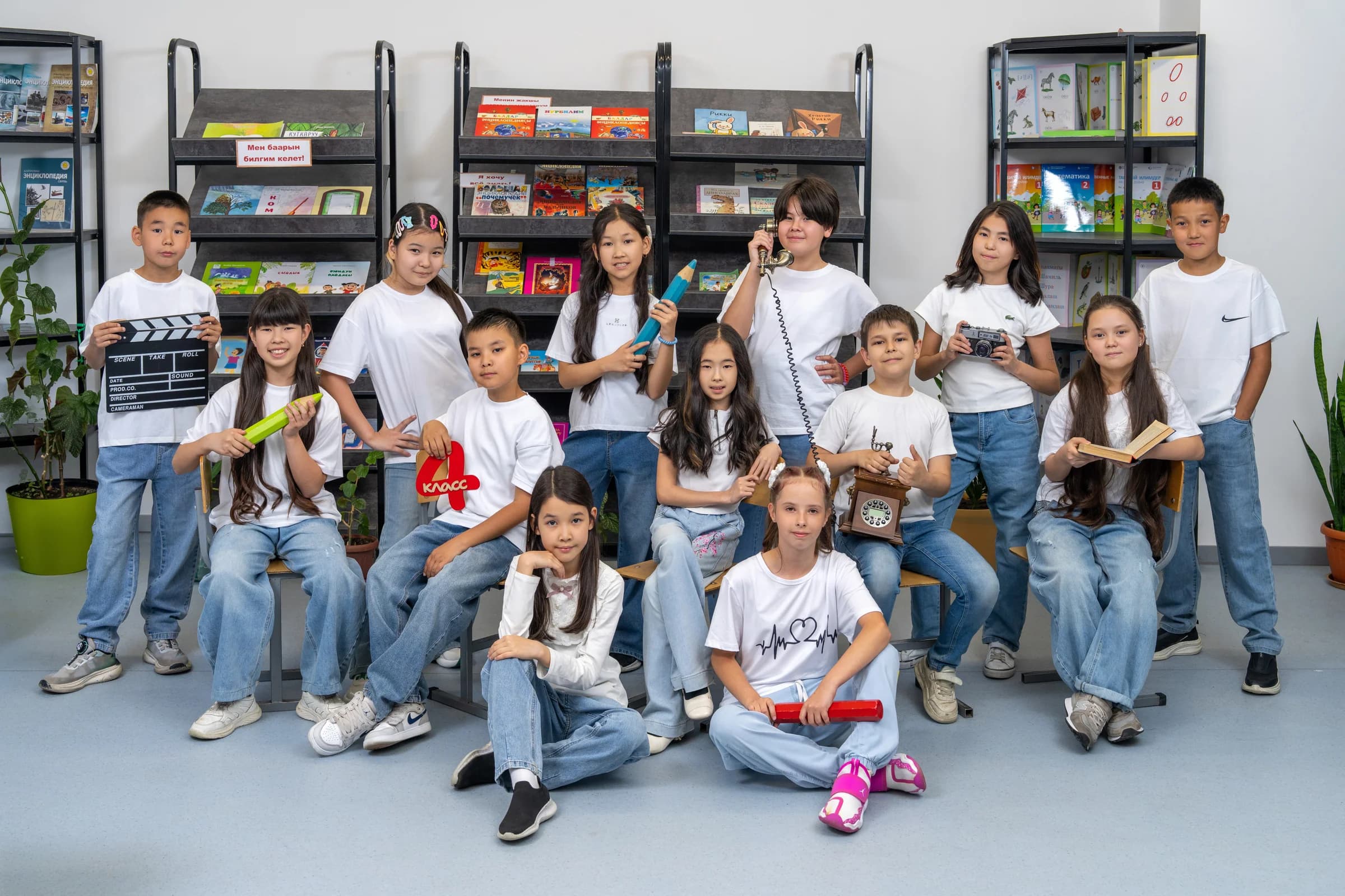 A junior class with books and school props